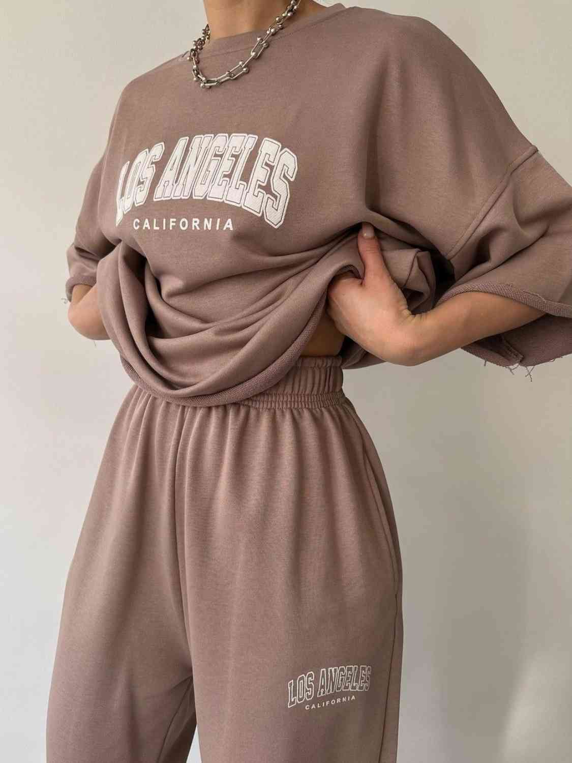 TFE: Matching sweatshirt and sweatpants set featuring LOS ANGELES CALIFORNIA graphic