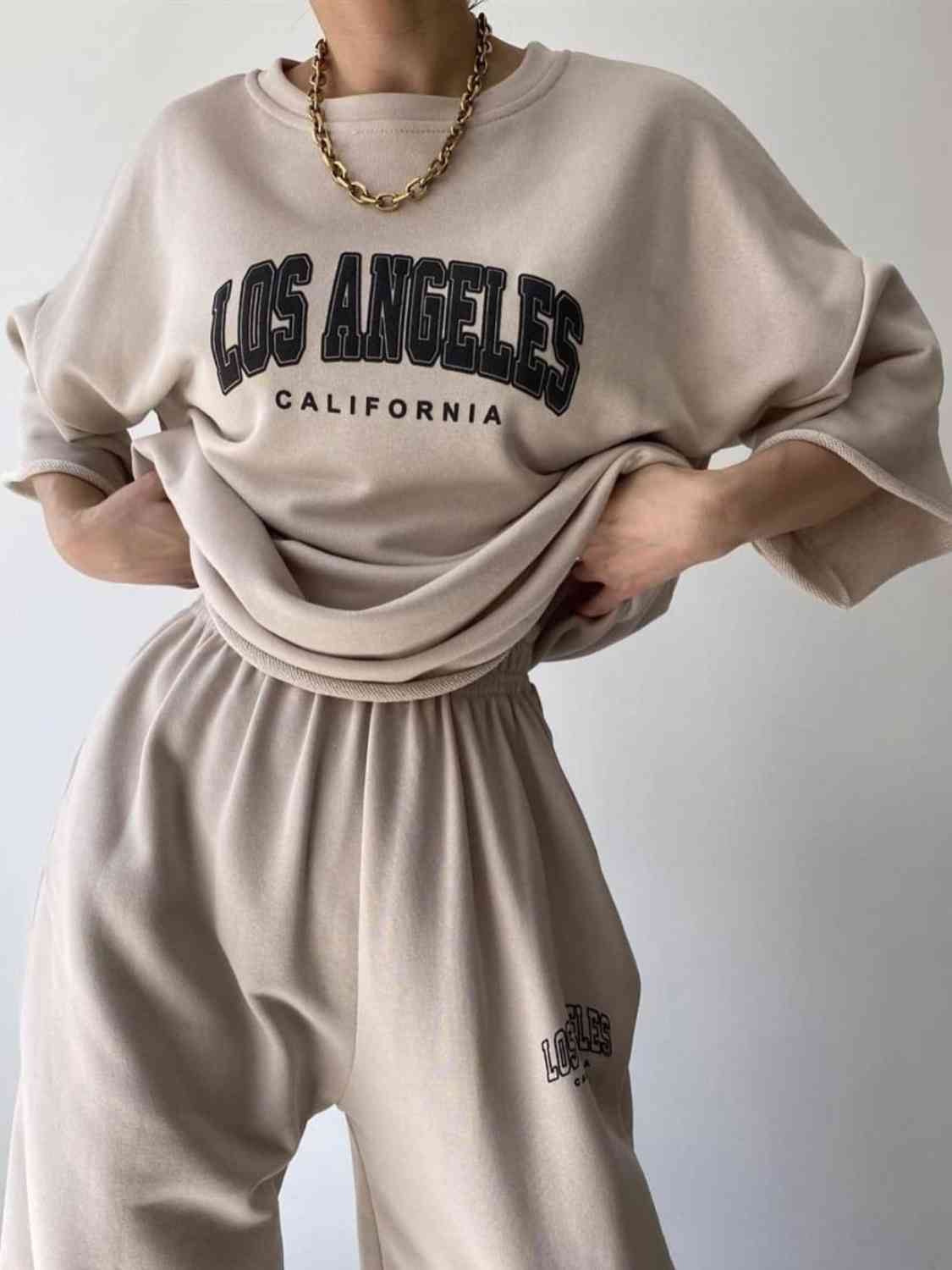 TFE: Matching sweatshirt and sweatpants set featuring LOS ANGELES CALIFORNIA graphic