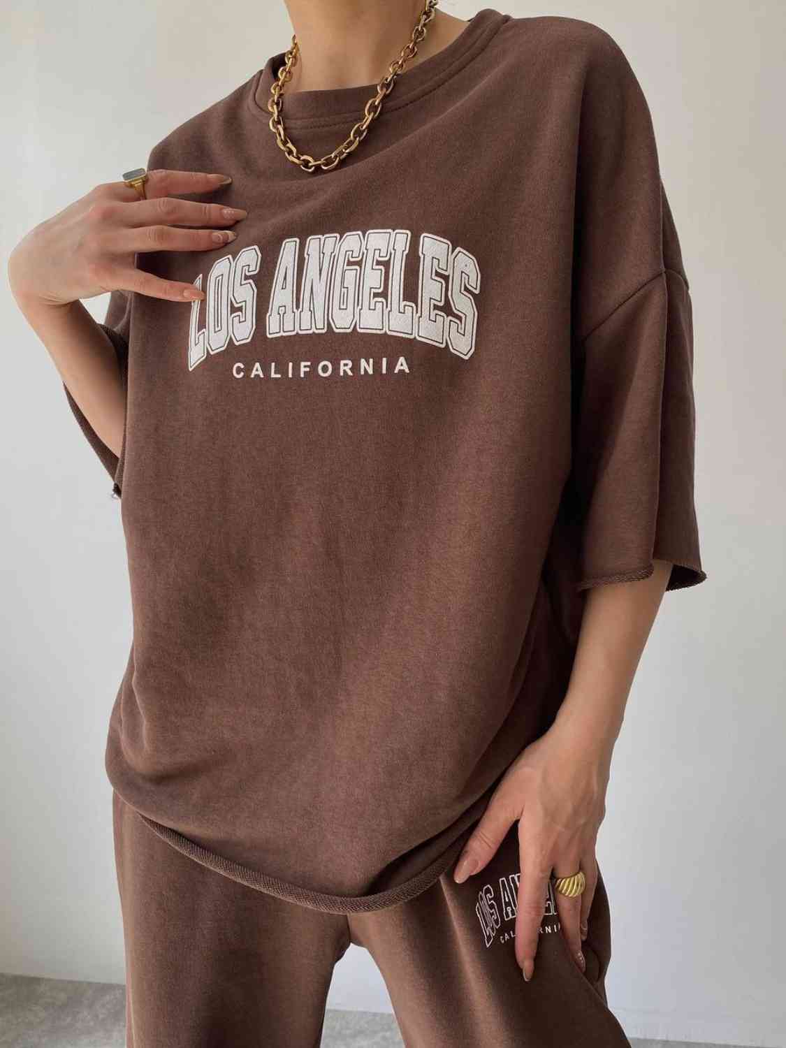 TFE: Matching sweatshirt and sweatpants set featuring LOS ANGELES CALIFORNIA graphic