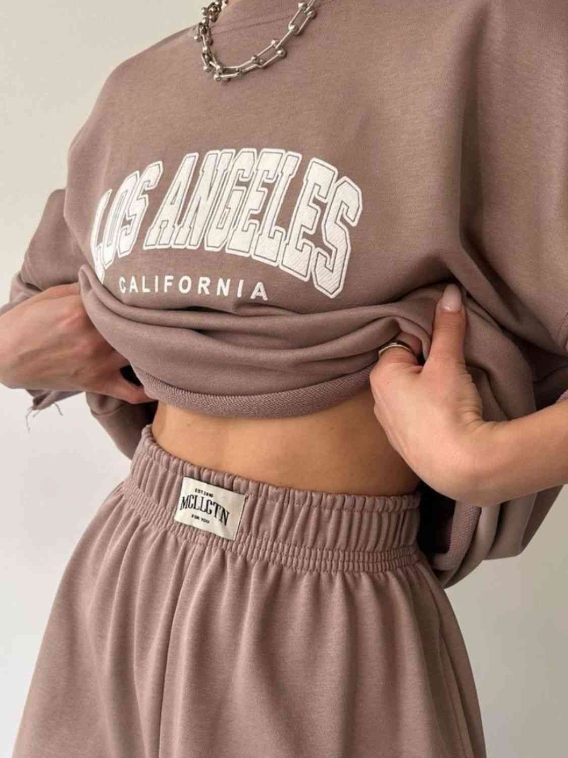 TFE: Matching sweatshirt and sweatpants set featuring LOS ANGELES CALIFORNIA graphic