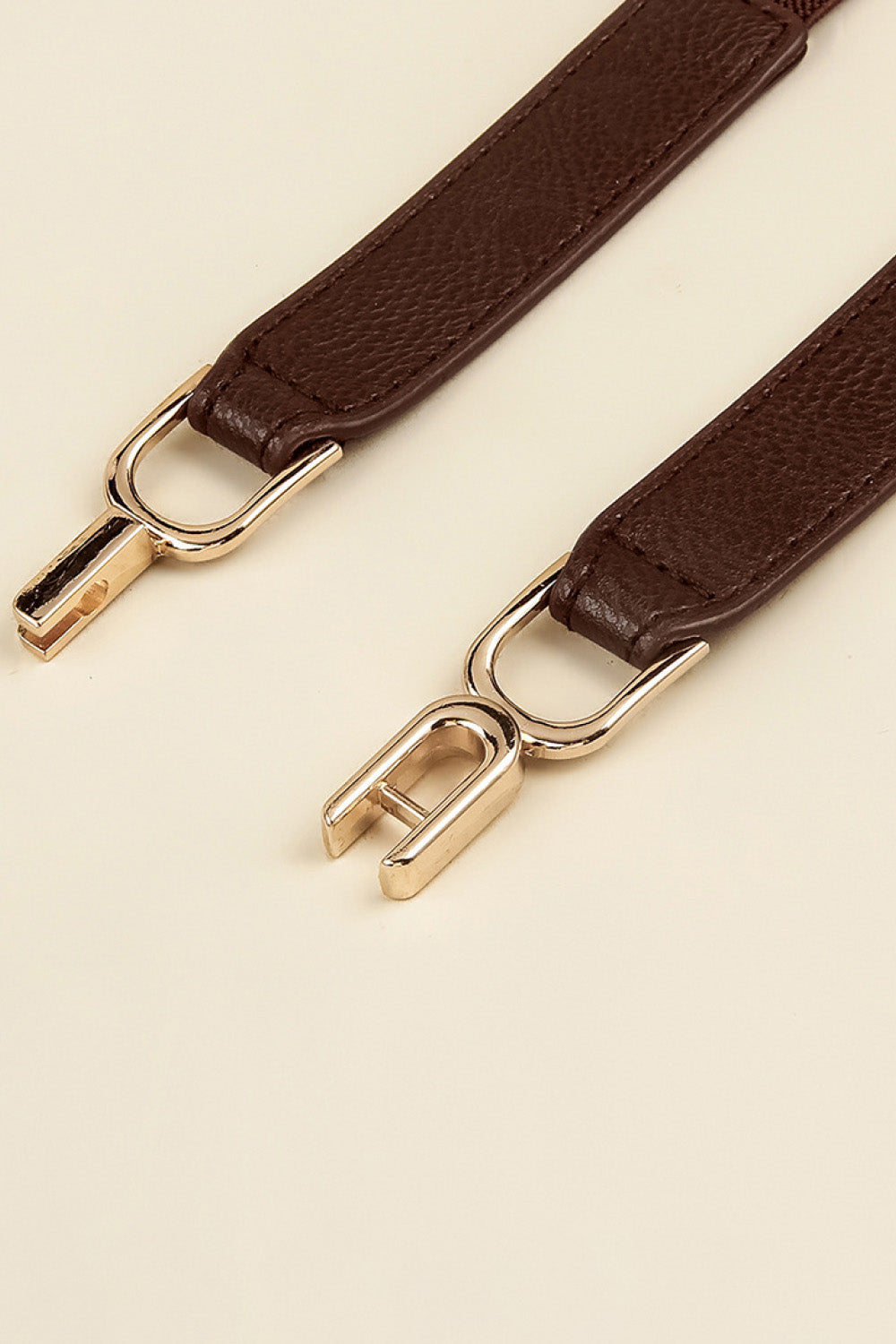 TFE: Stretchable Belt with Metal Clasp