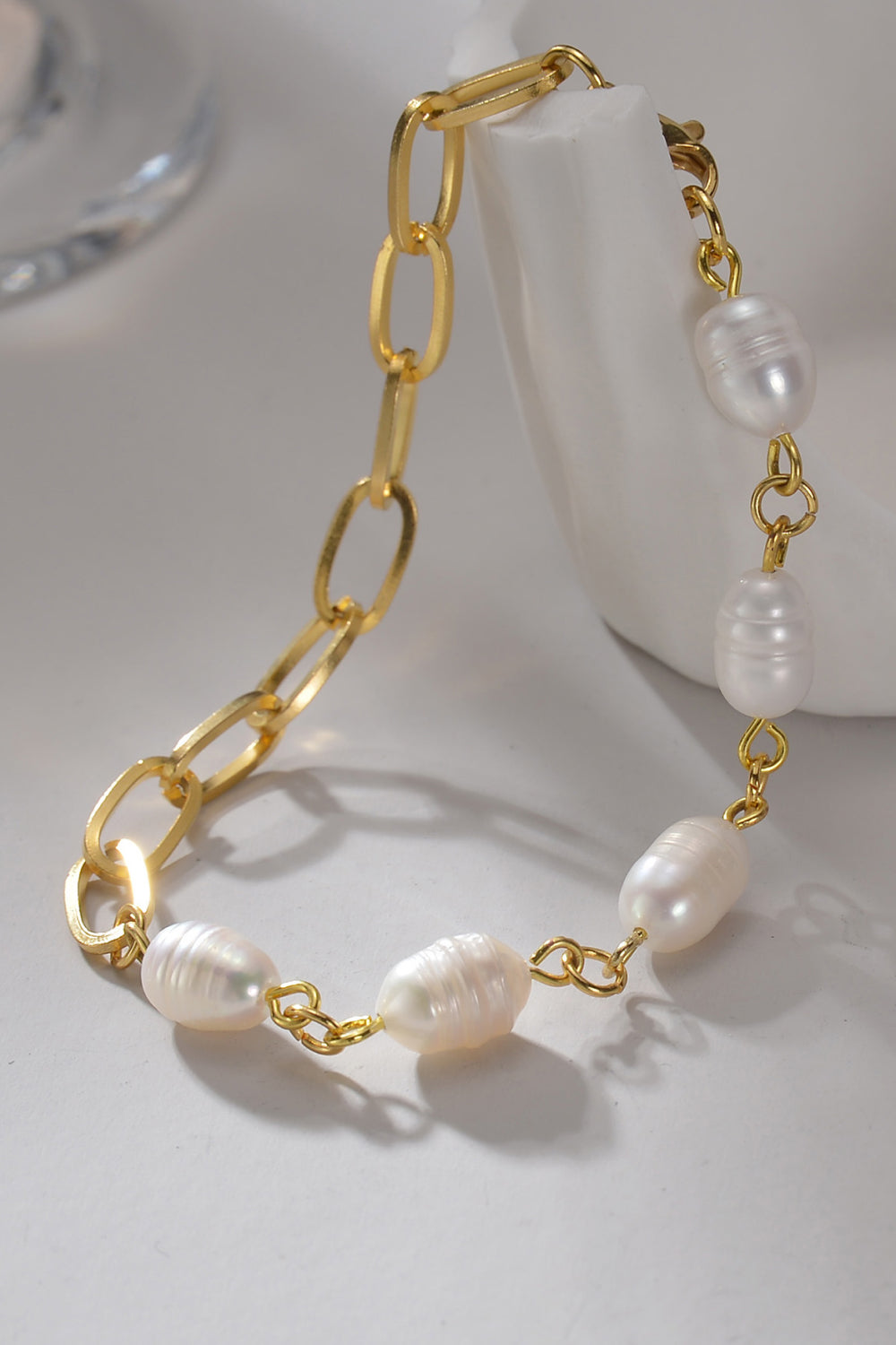 TFE: Stainless Steel Bracelet with a Combination of Half Pearls and Half Chain