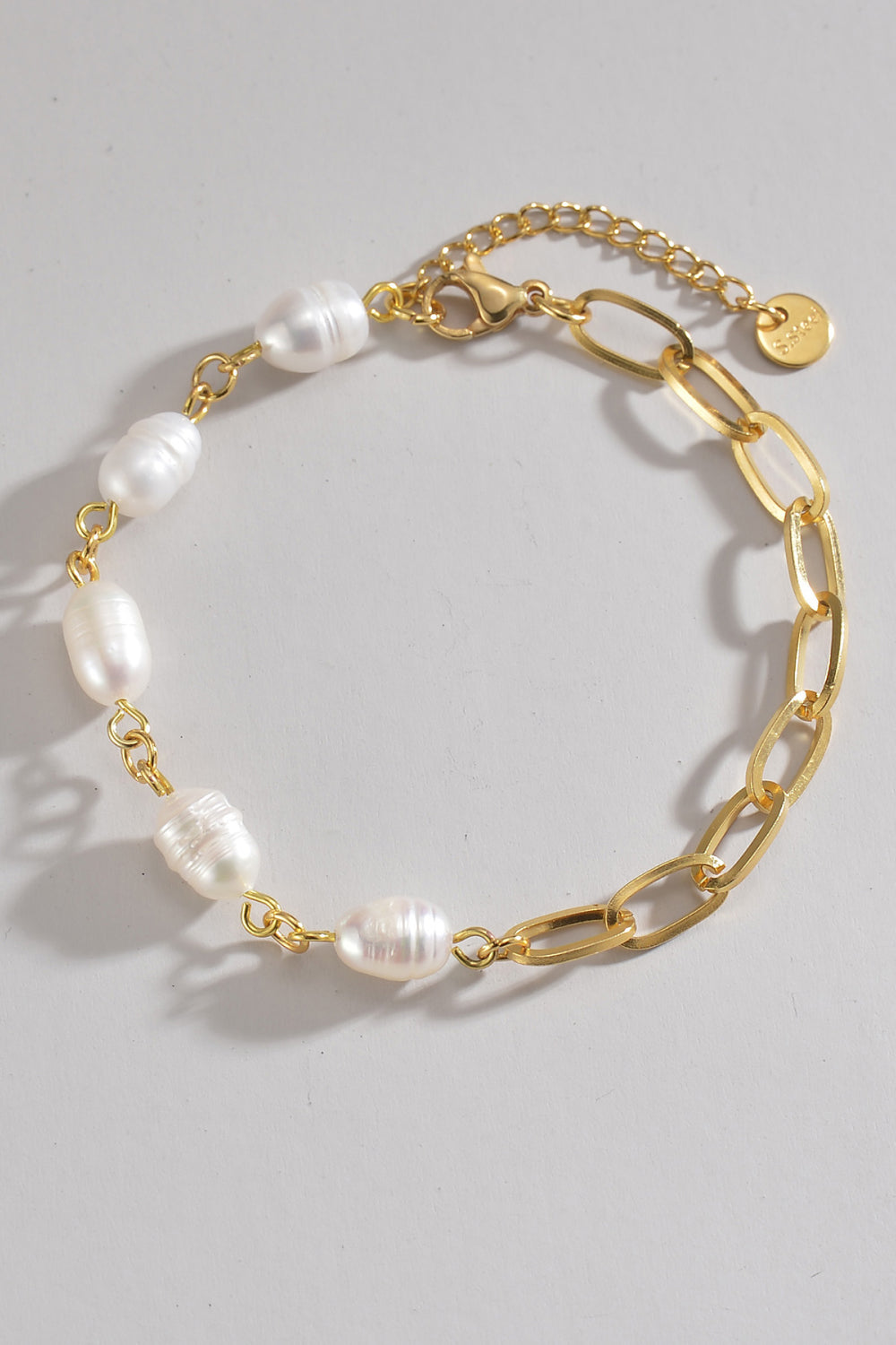 TFE: Stainless Steel Bracelet with a Combination of Half Pearls and Half Chain