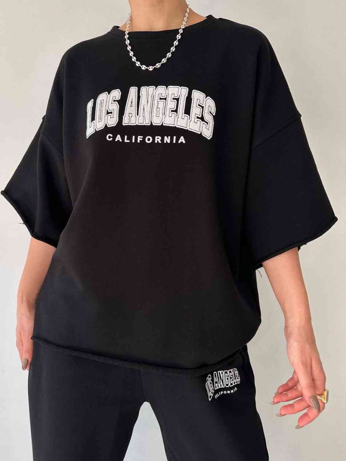 TFE: Matching sweatshirt and sweatpants set featuring LOS ANGELES CALIFORNIA graphic